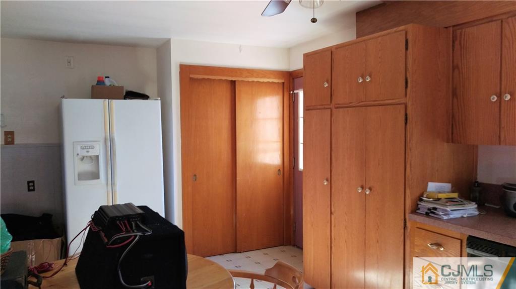 333 Amboy Road Old Bridge, NJ 07747 - Photo 6 of 17 a bedroom with a bed and furniture