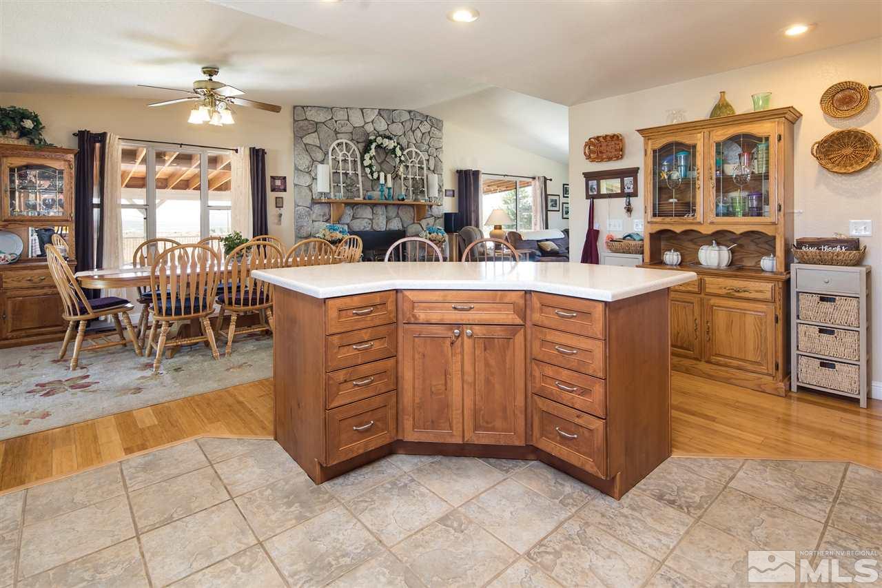 10385 Placerville Road Reno, NV 89508 - Photo 14 of 25 a kitchen with cabinets and chairs