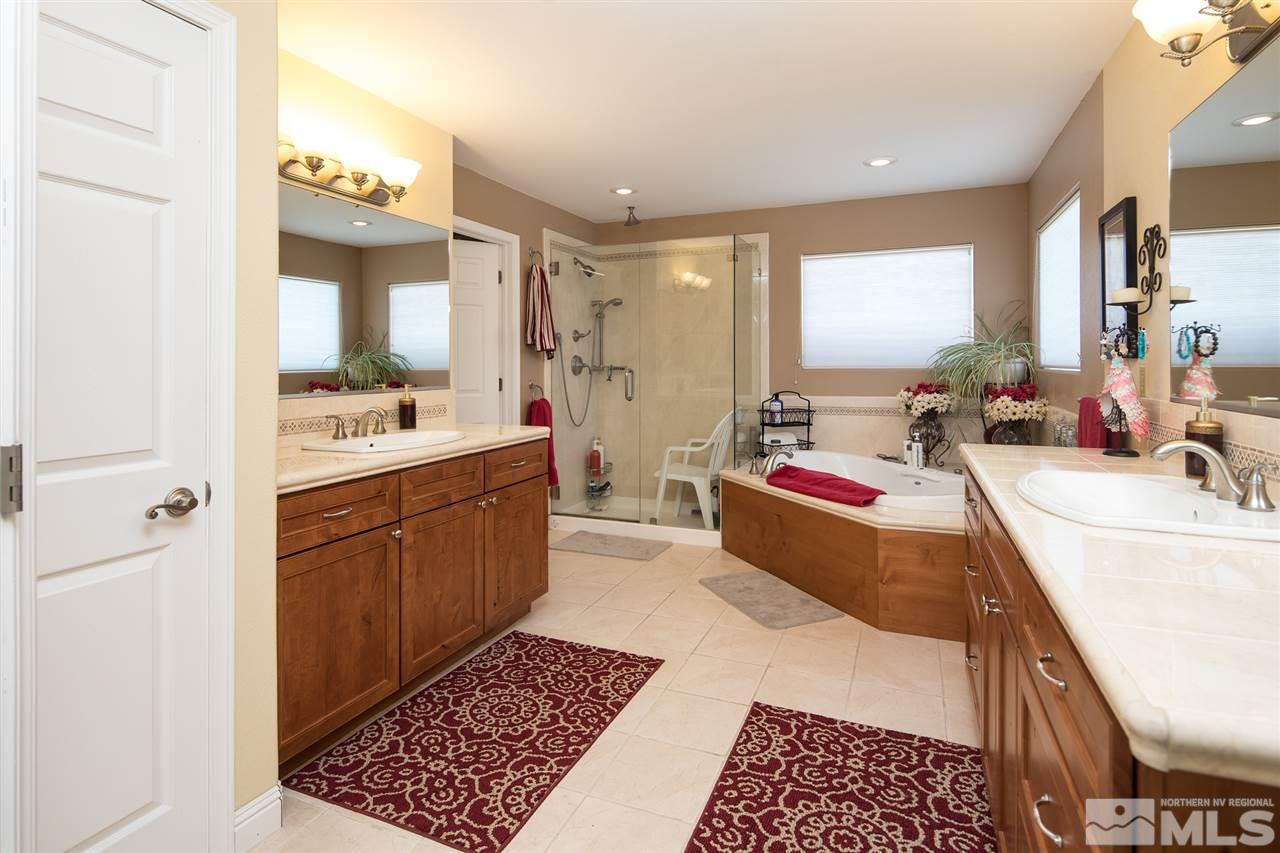 10385 Placerville Road Reno, NV 89508 - Photo 17 of 25 a bed room with a bed and a window