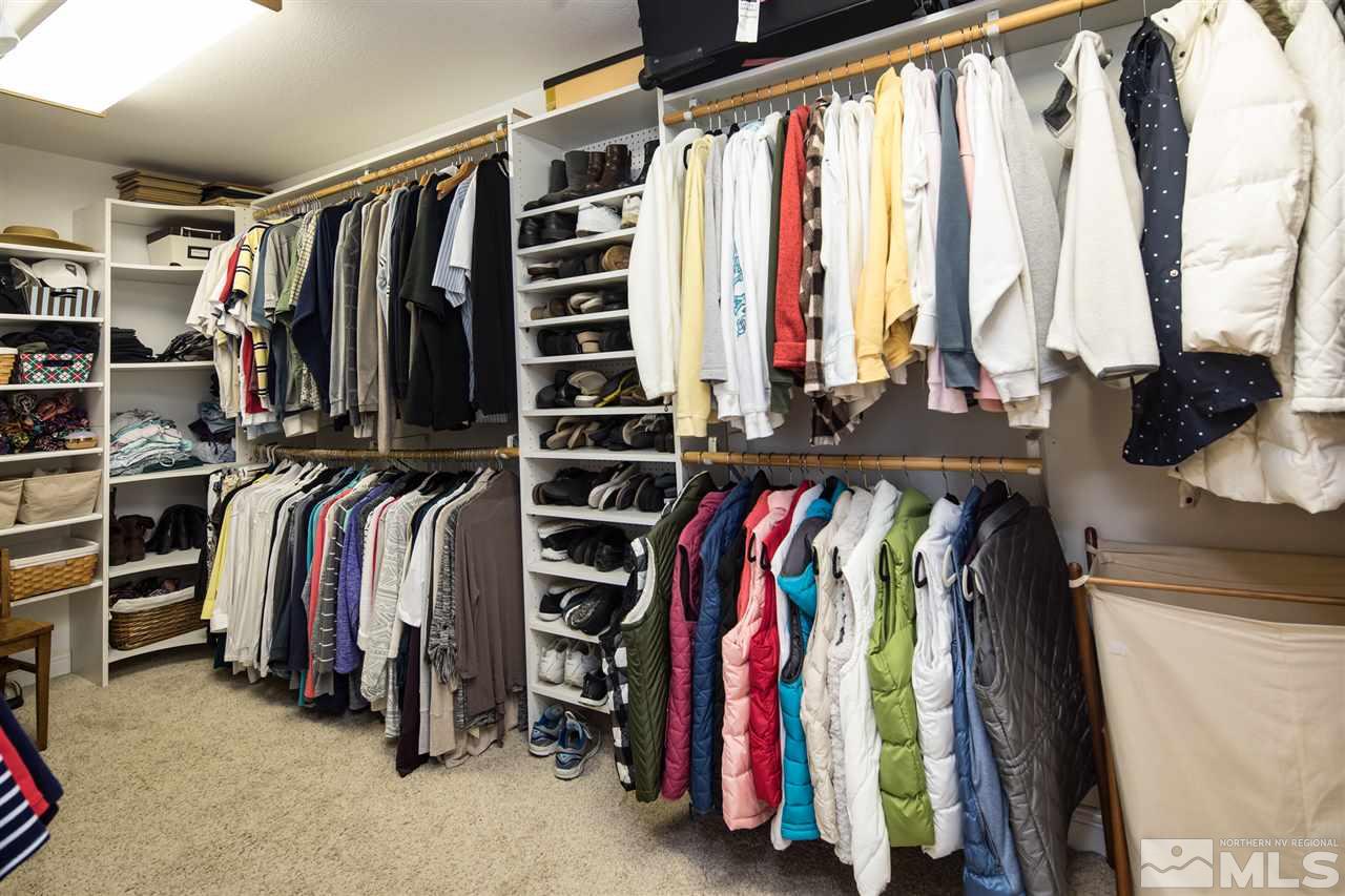 10385 Placerville Road Reno, NV 89508 - Photo 18 of 25 a view of walk in closet with clothes and shoes