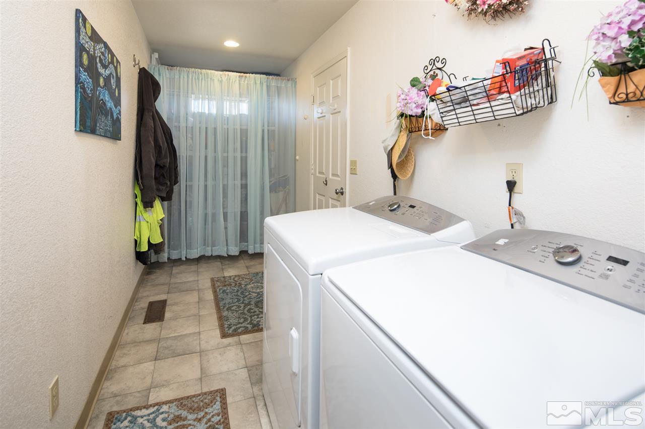 10385 Placerville Road Reno, NV 89508 - Photo 23 of 25 a bathroom with a sink and mirror