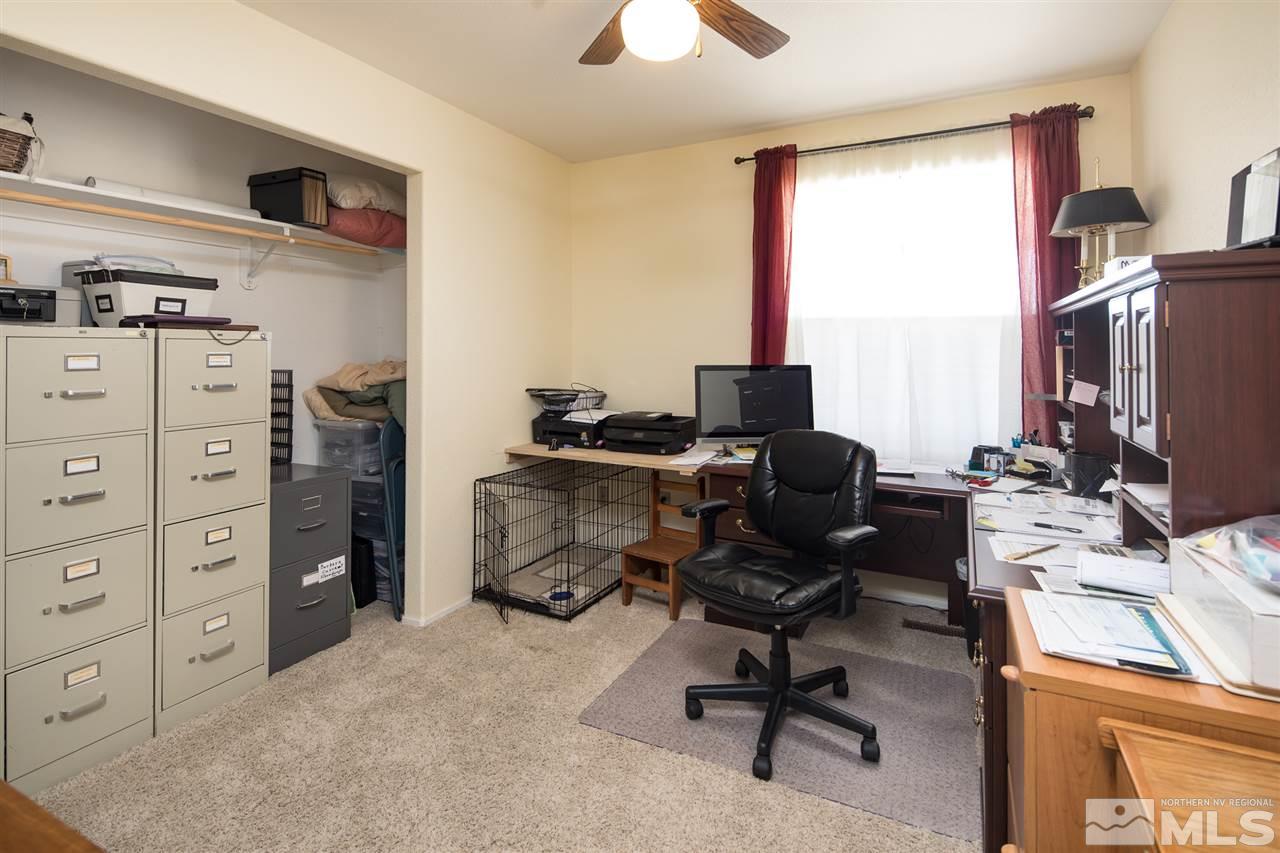 10385 Placerville Road Reno, NV 89508 - Photo 24 of 25 a view of a workspace with furniture and a window