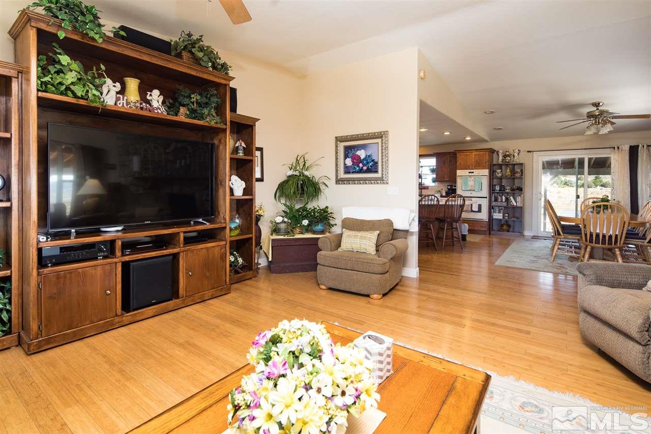 10385 Placerville Road Reno, NV 89508 - Photo 10 of 25 a living room with furniture and a flat screen tv