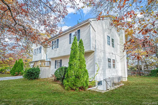 a view of backyard with a garden and plants