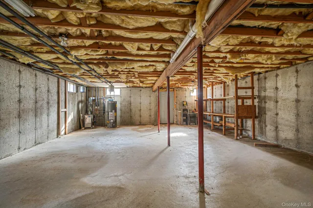 a view of a room with wooden walls
