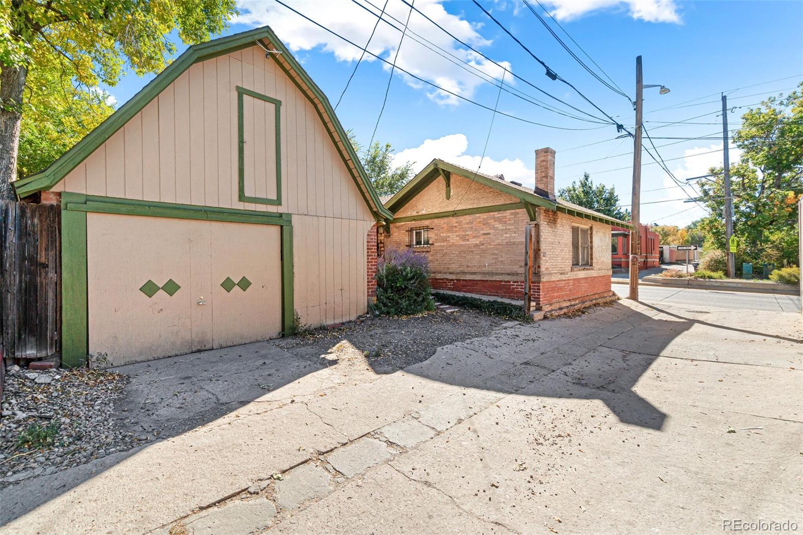 2089 South Logan Street Denver, CO 80210 - Photo 15 of 41 a view of a small white house
