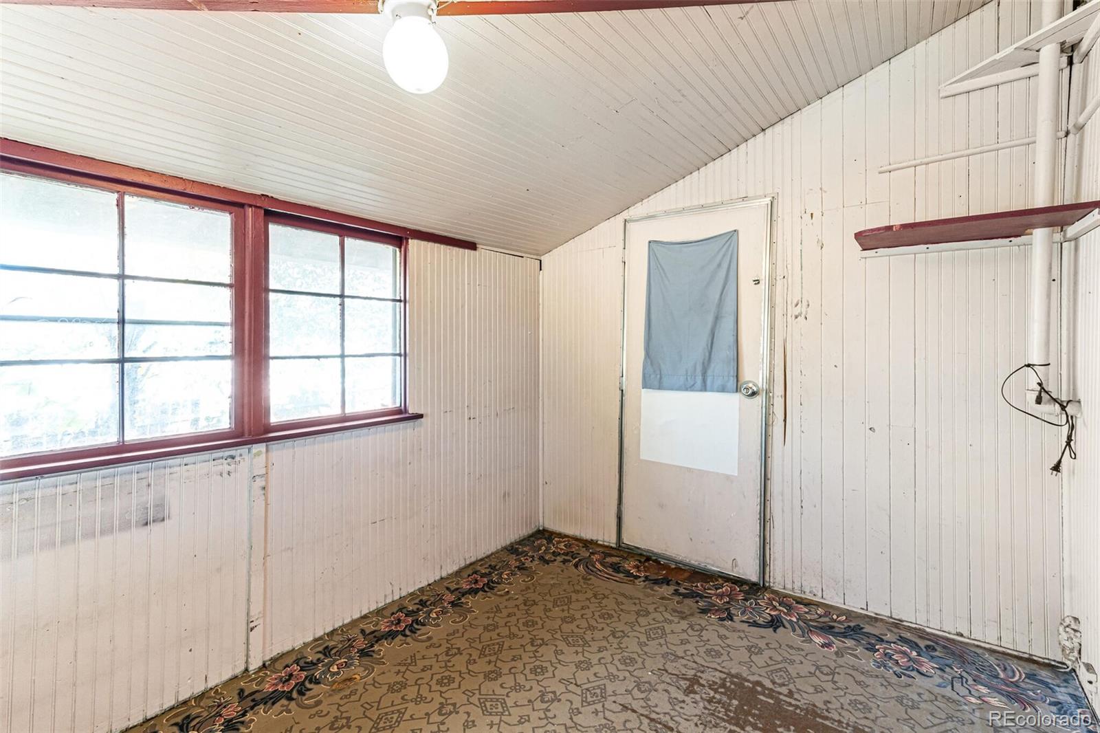 2089 South Logan Street Denver, CO 80210 - Photo 27 of 41 a view of an empty room