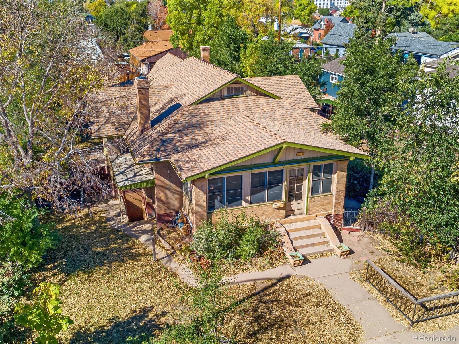 2089 South Logan Street Denver, CO 80210 - Photo 3 of 41 an aerial view of a house with a yard