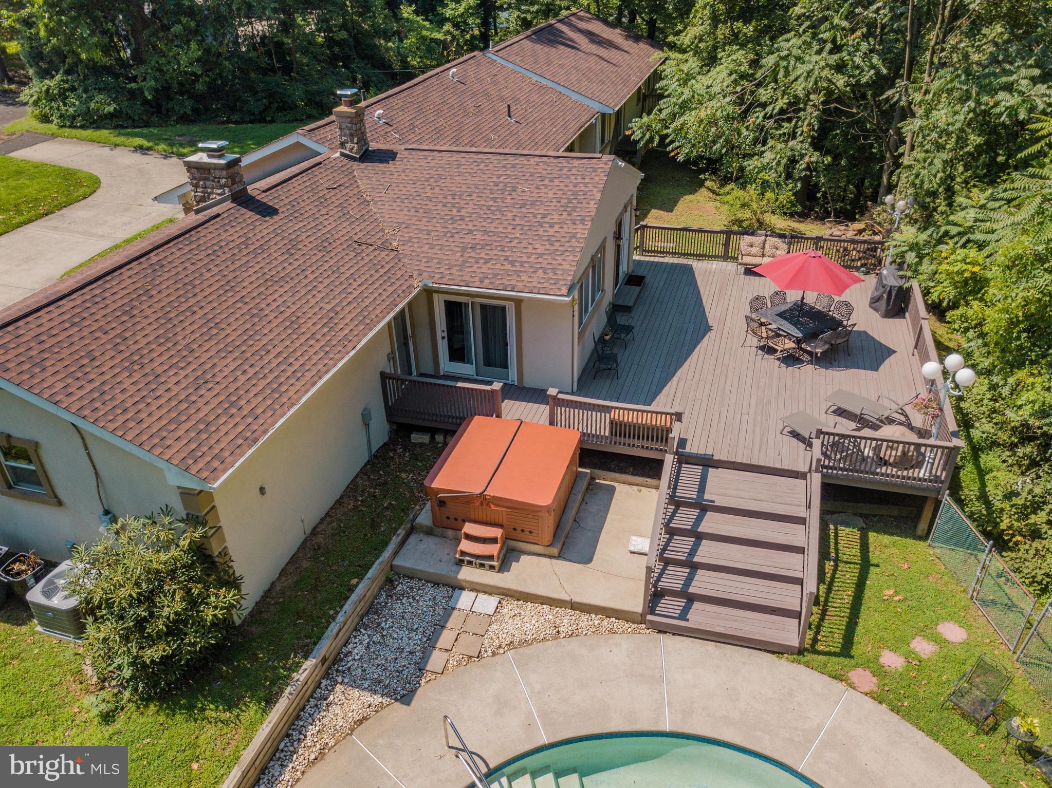 285 Shoemaker Road Huntingdon Valley, PA 19006 - Photo 1 of 46 aerial view of a house with a garden