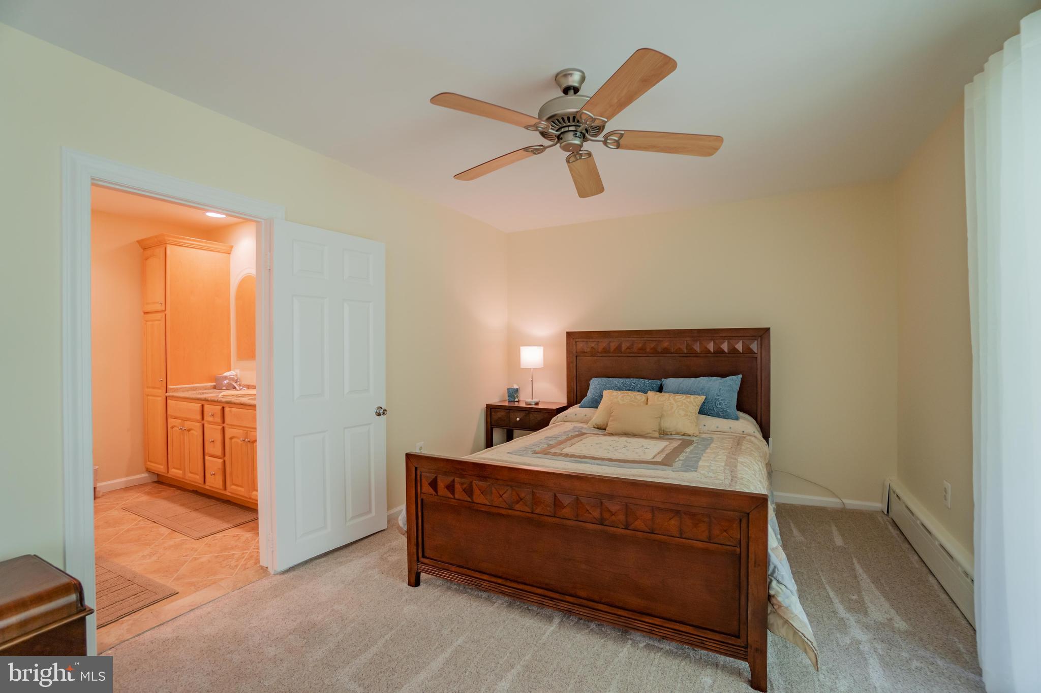 285 Shoemaker Road Huntingdon Valley, PA 19006 - Photo 19 of 46 a bedroom with a bed and a window