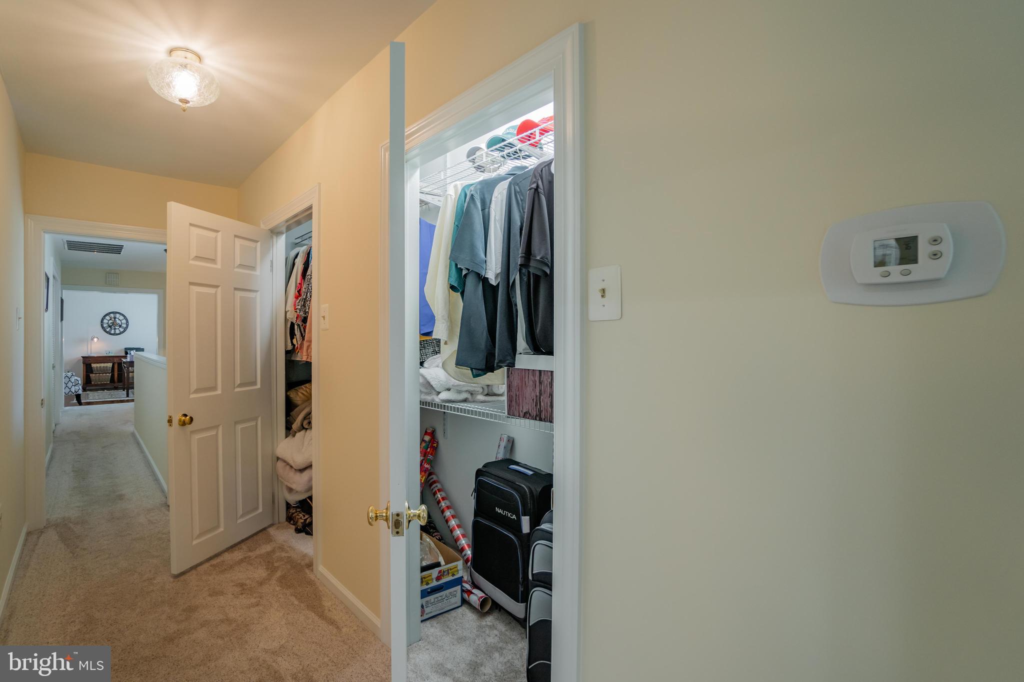 285 Shoemaker Road Huntingdon Valley, PA 19006 - Photo 24 of 46 a view of a hallway with closet and a bathroom