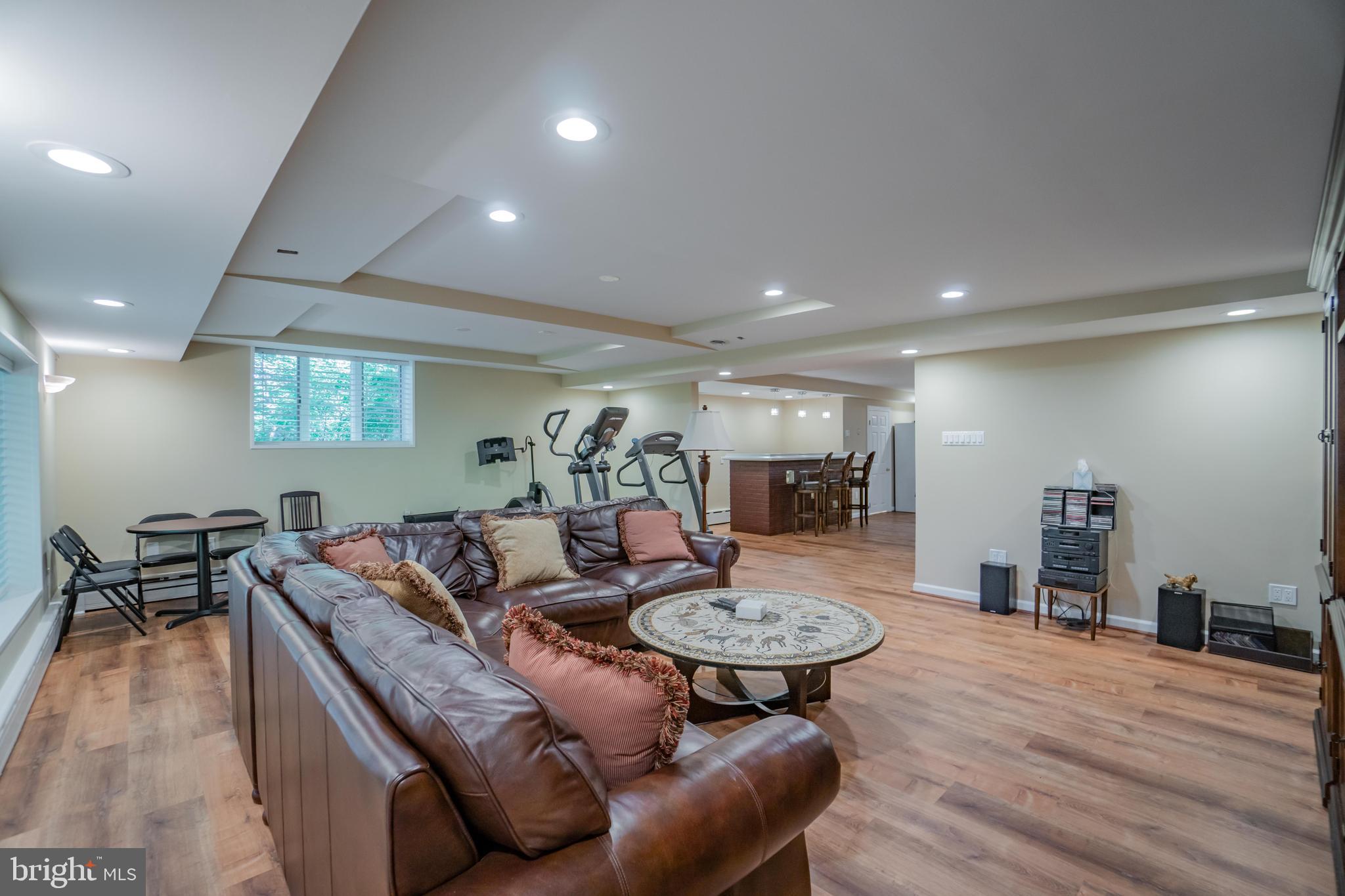 285 Shoemaker Road Huntingdon Valley, PA 19006 - Photo 26 of 46 a living room with furniture and wooden floor