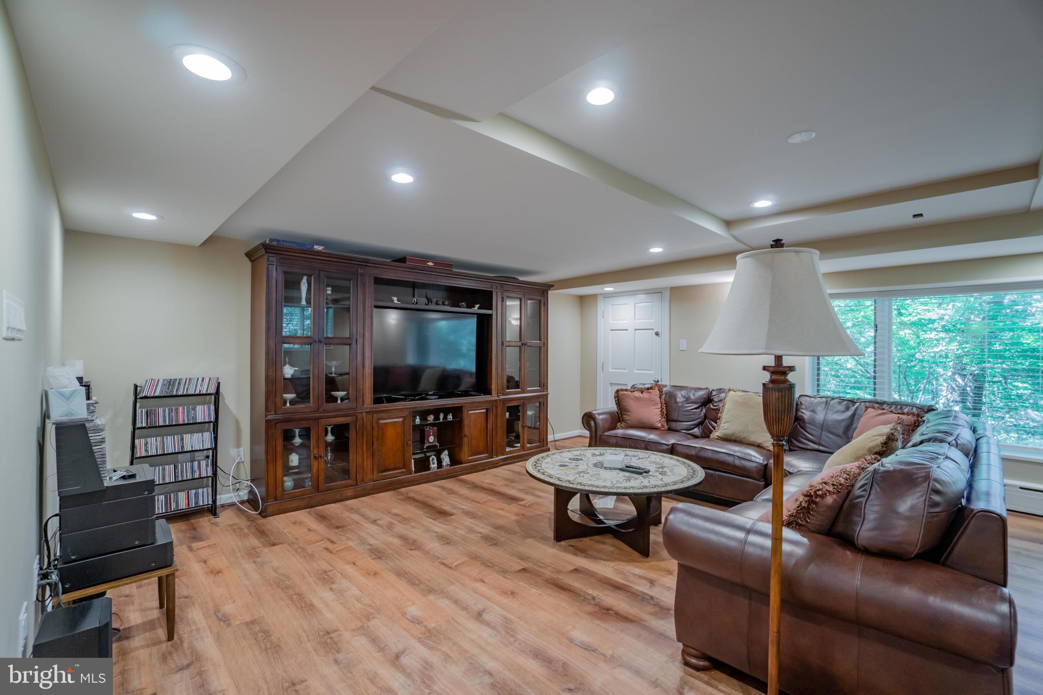 285 Shoemaker Road Huntingdon Valley, PA 19006 - Photo 27 of 46 a living room with furniture and a flat screen tv
