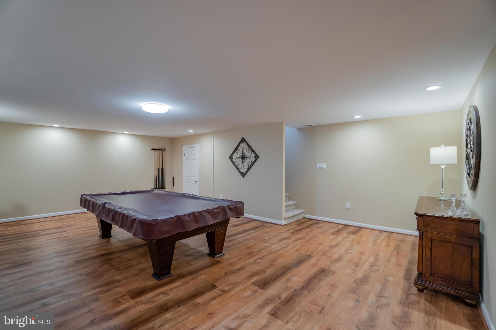 285 Shoemaker Road Huntingdon Valley, PA 19006 - Photo 29 of 46 a room with wooden floor and pool table