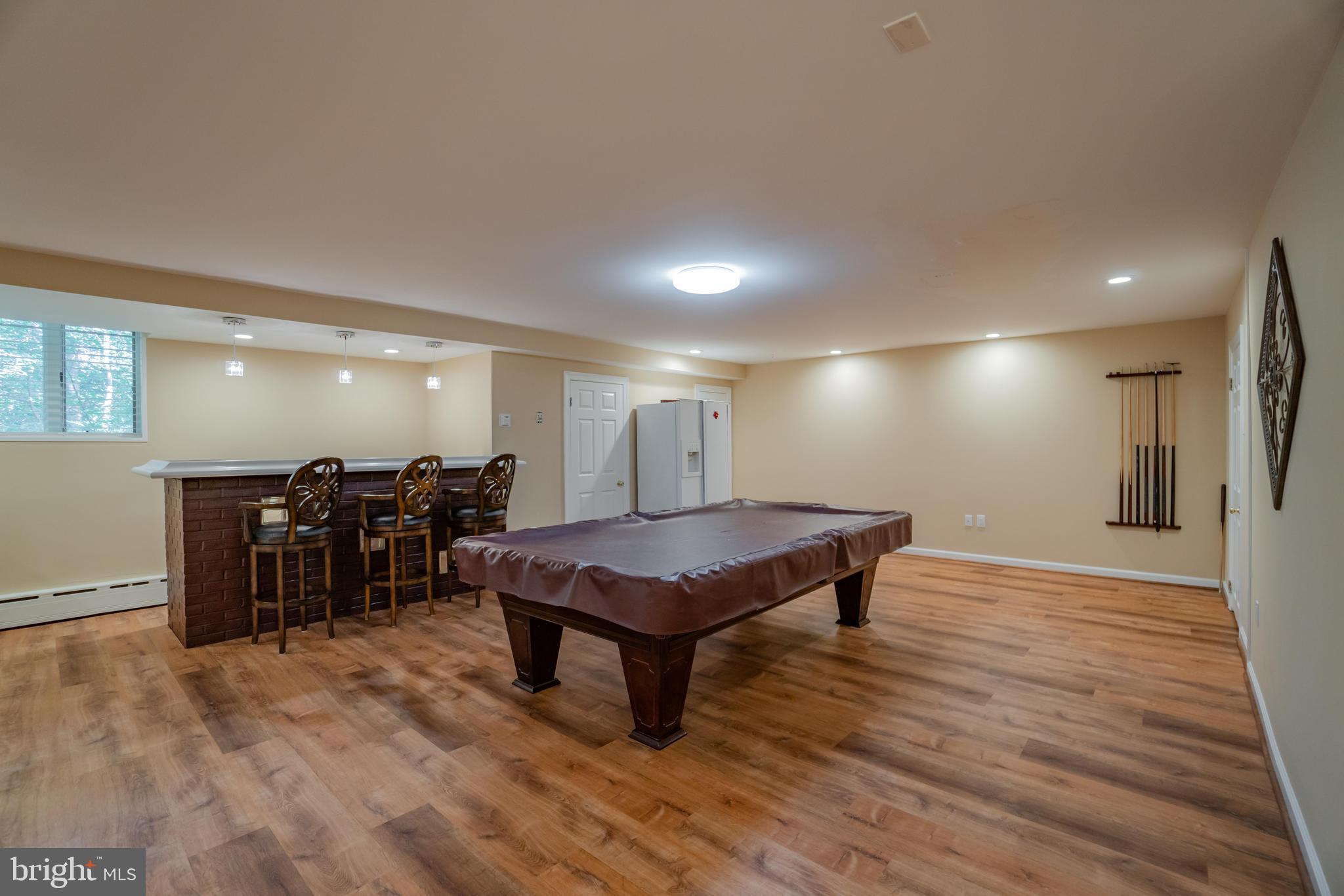 285 Shoemaker Road Huntingdon Valley, PA 19006 - Photo 30 of 46 a room with furniture and wooden floor