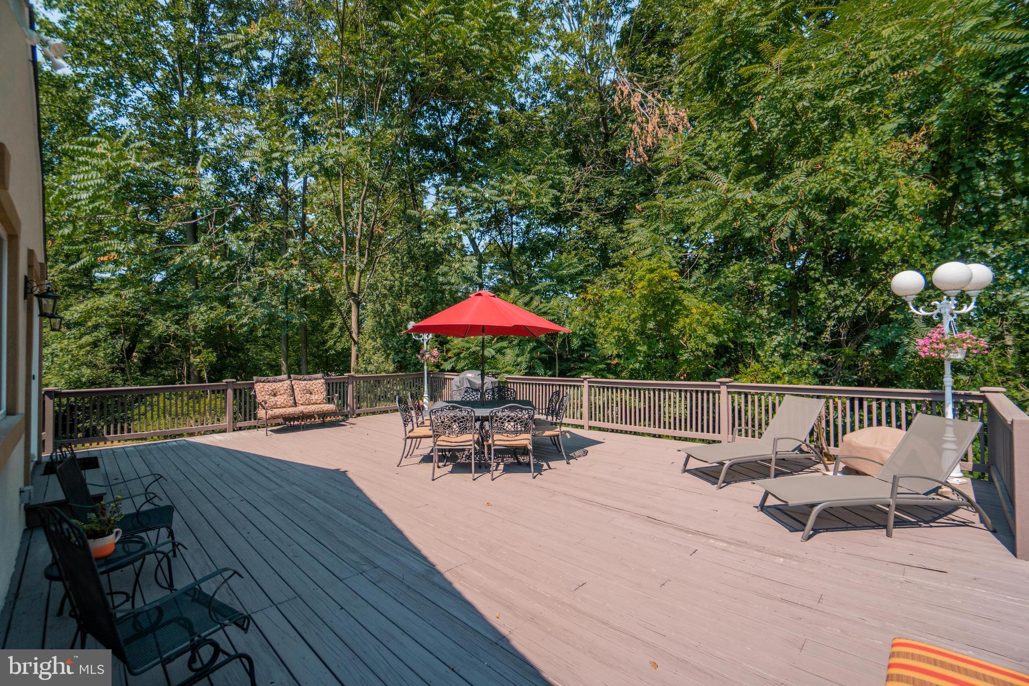 285 Shoemaker Road Huntingdon Valley, PA 19006 - Photo 36 of 46 a view of a backyard with sitting area