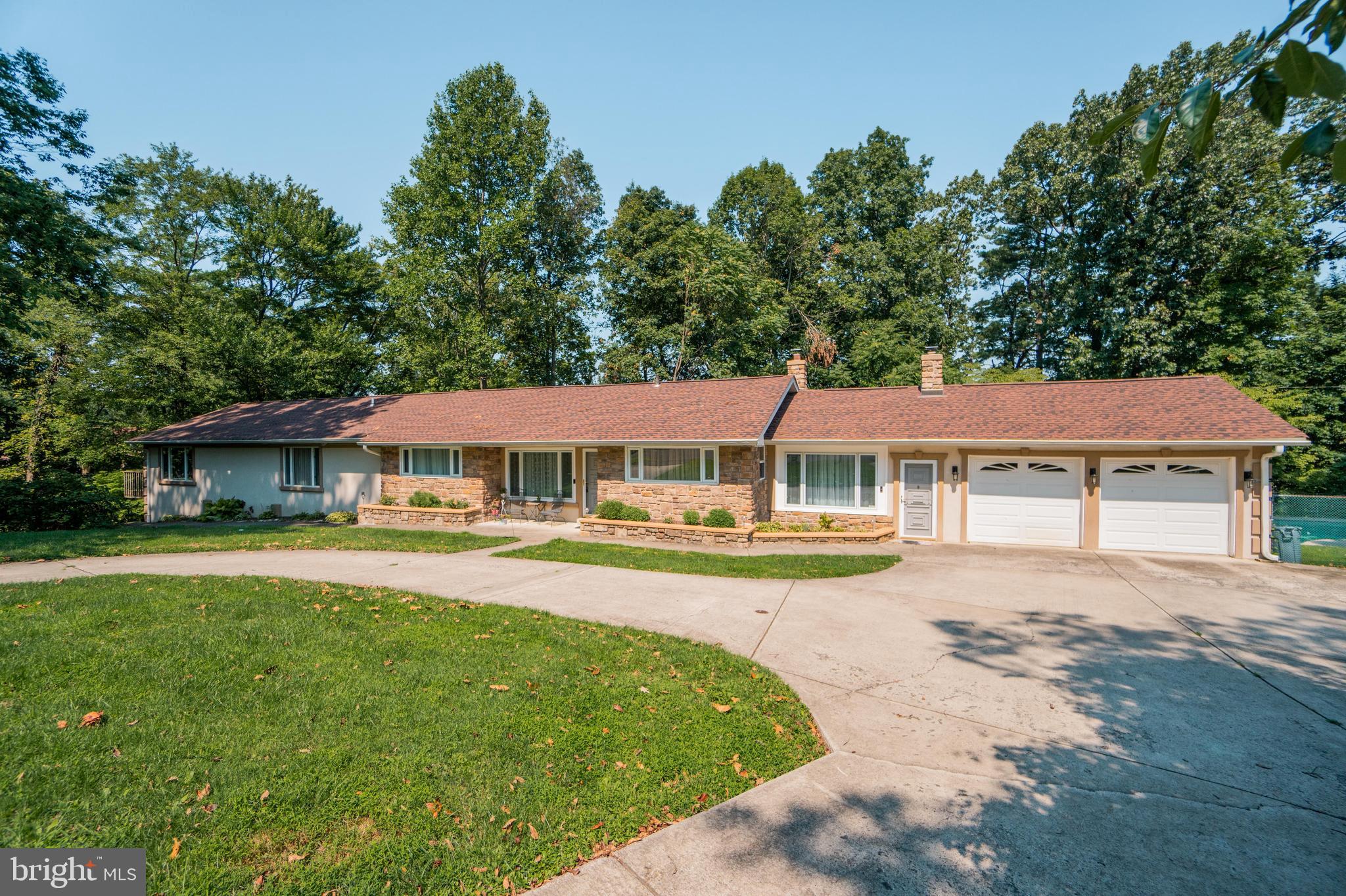 285 Shoemaker Road Huntingdon Valley, PA 19006 - Photo 43 of 46 a view of a house with swimming pool and sitting area