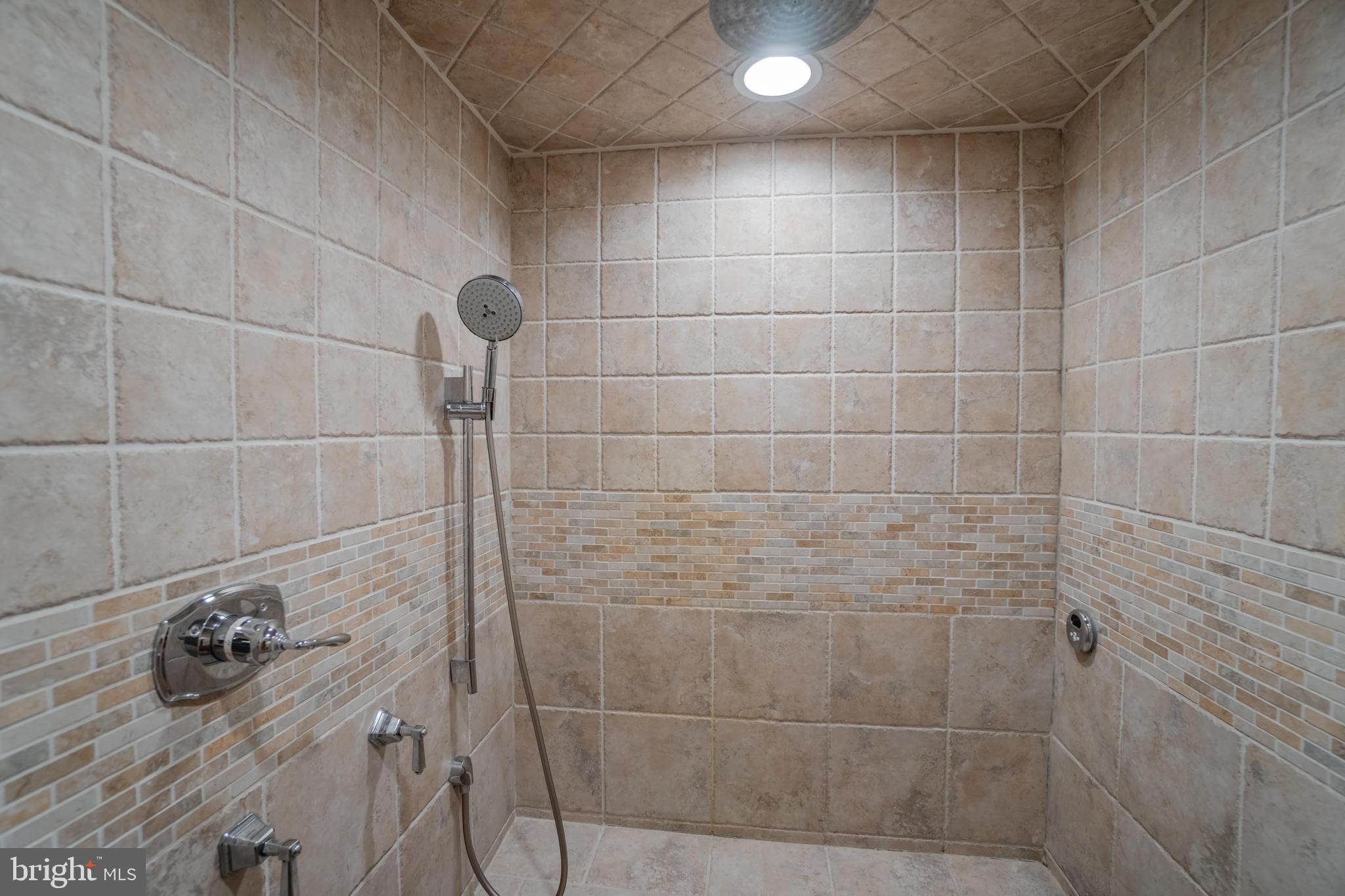 285 Shoemaker Road Huntingdon Valley, PA 19006 - Photo 9 of 46 a bathroom with a shower