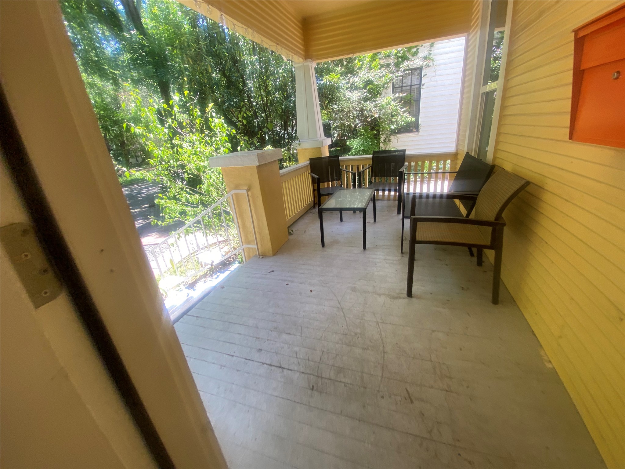 3010 Fruth Street, Unit A Austin, TX 78705 - Photo 37 of 39 An inviting porch with ample space for outdoor relaxation.