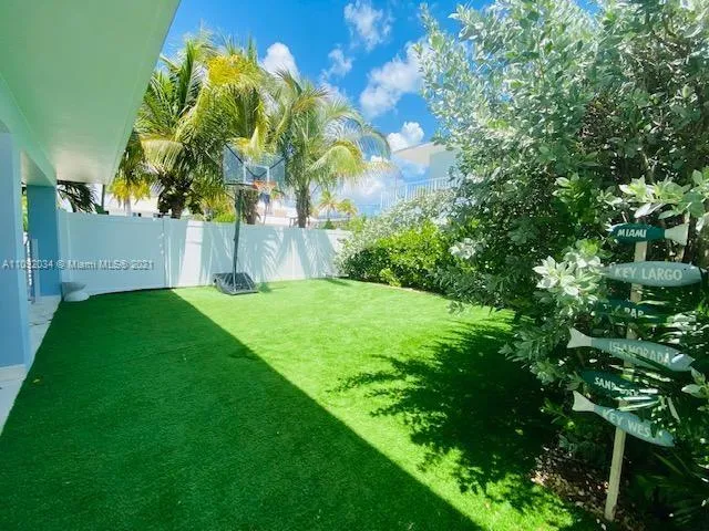a view of a garden with a tree