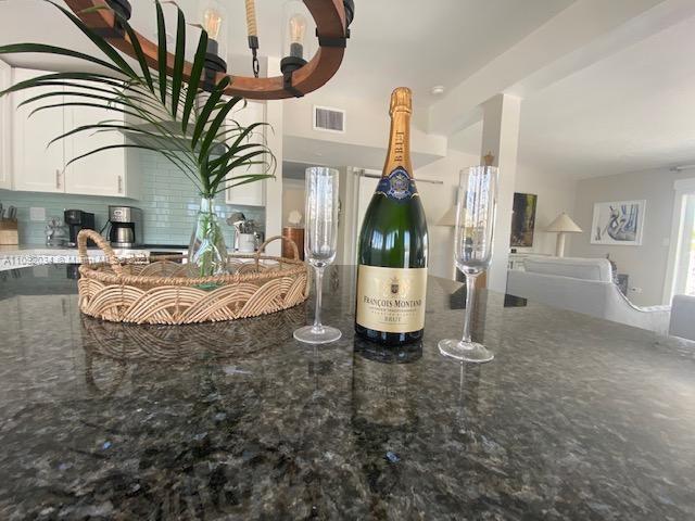 203 Atlantic Boulevard, Unit 203 Key Largo, FL 33037 - Photo 38 of 41 a view of living room kitchen and entryway