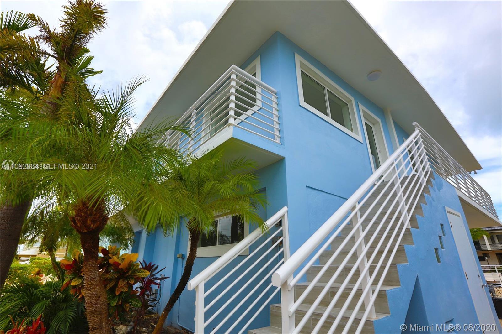 203 Atlantic Boulevard, Unit 203 Key Largo, FL 33037 - Photo 40 of 41 a view of balcony with an outdoor space