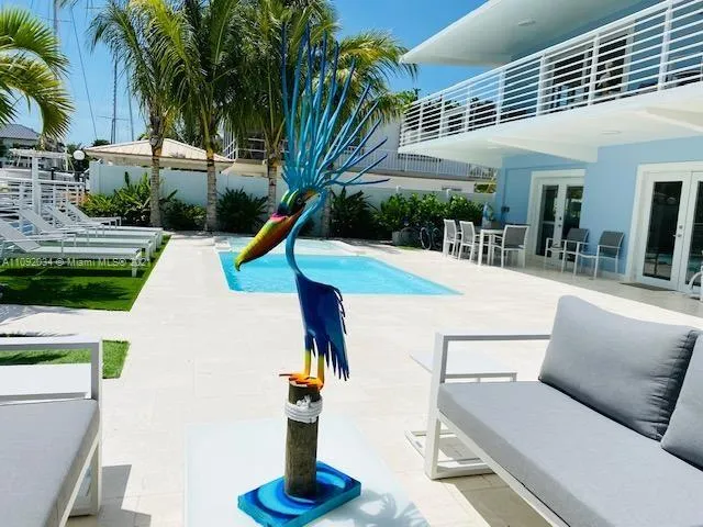 a view of a house with swimming pool