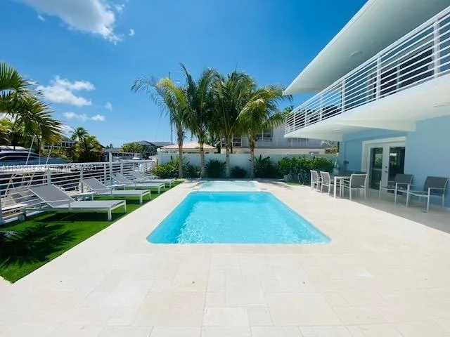 a view of outdoor space yard deck patio and swimming pool