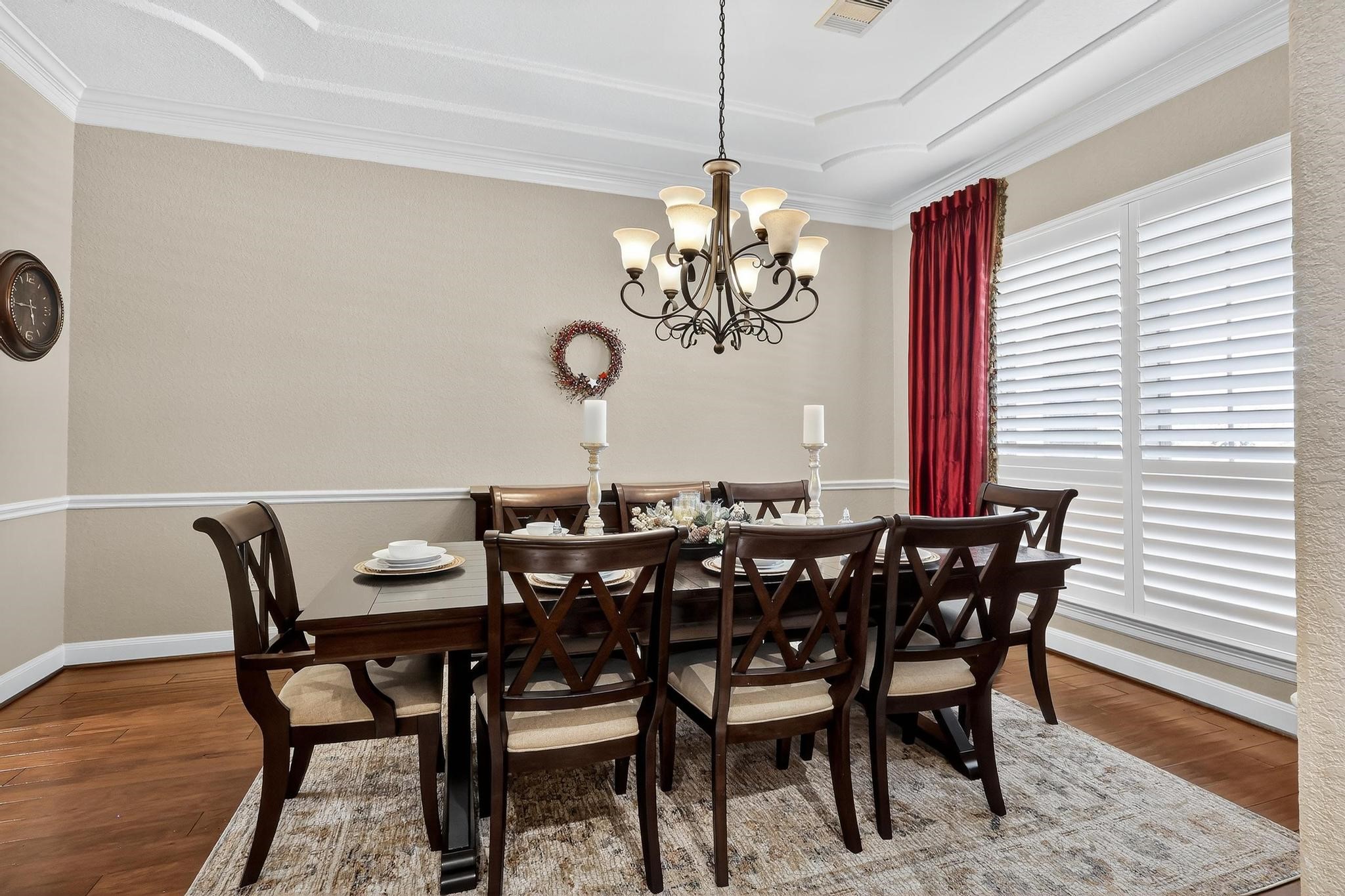 25803 Heritage Maple Drive Spring, TX 77389 - Photo 6 of 46 a view of a dining room with furniture wooden floor and chandelier