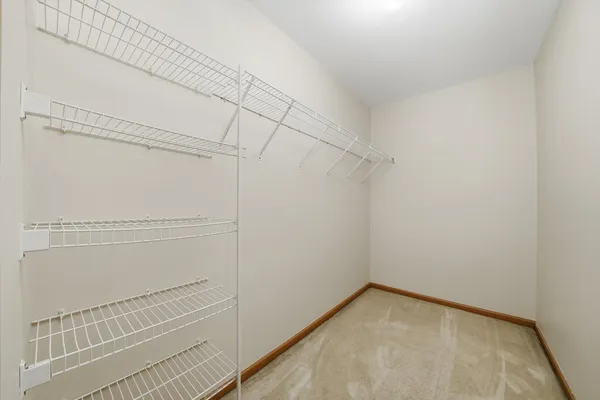 a view of a room with racks on the wall