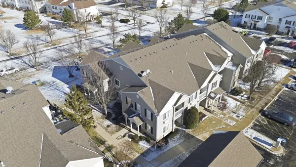with view of a house with a lot of trees