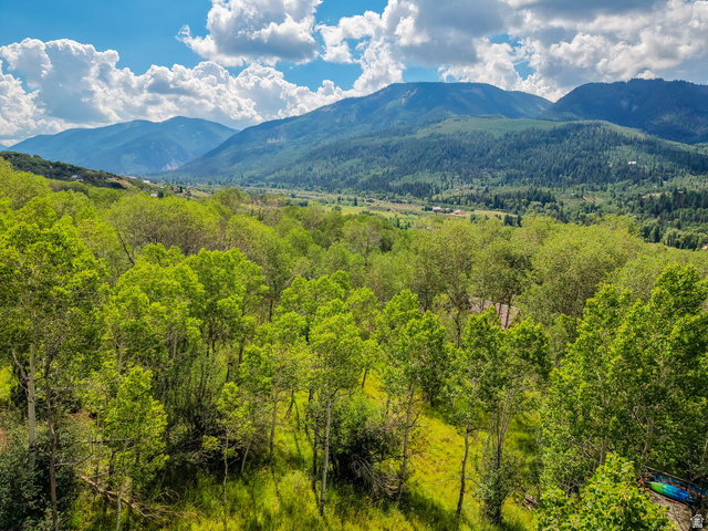 5426 East Colter Road, Unit 33 Kamas, UT 84036 - Photo 26 of 45 Mountain landscape featuring a valley with lush green trees and distant peaks