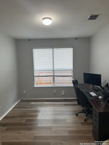 a room with furniture and window