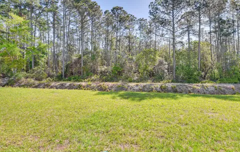a view of a street with a building in the background