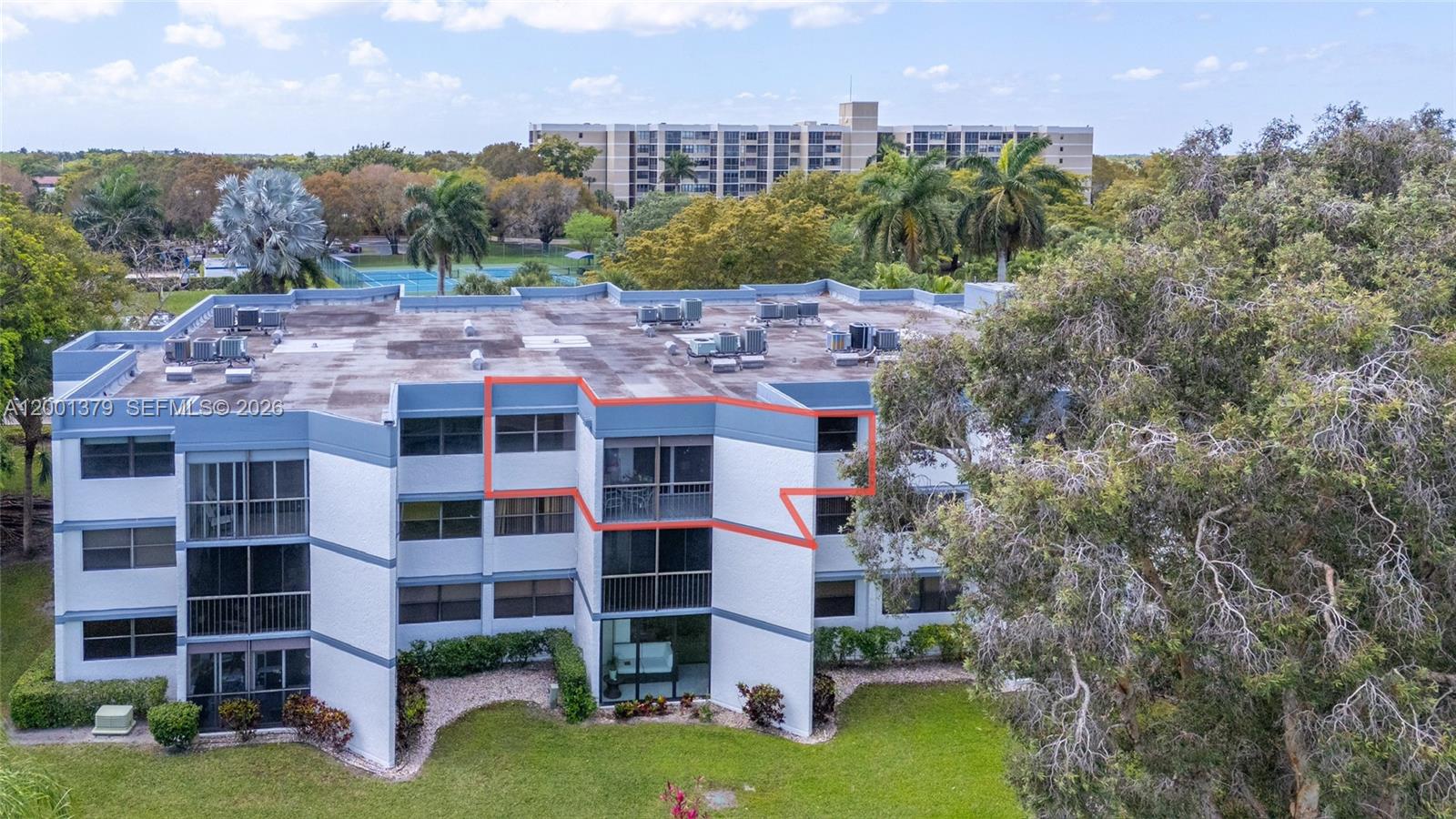 16251 Golf Club Road, Unit 311 Weston, FL 33326 - Photo 29 of 38 a view of a city with tall buildings and a big yard