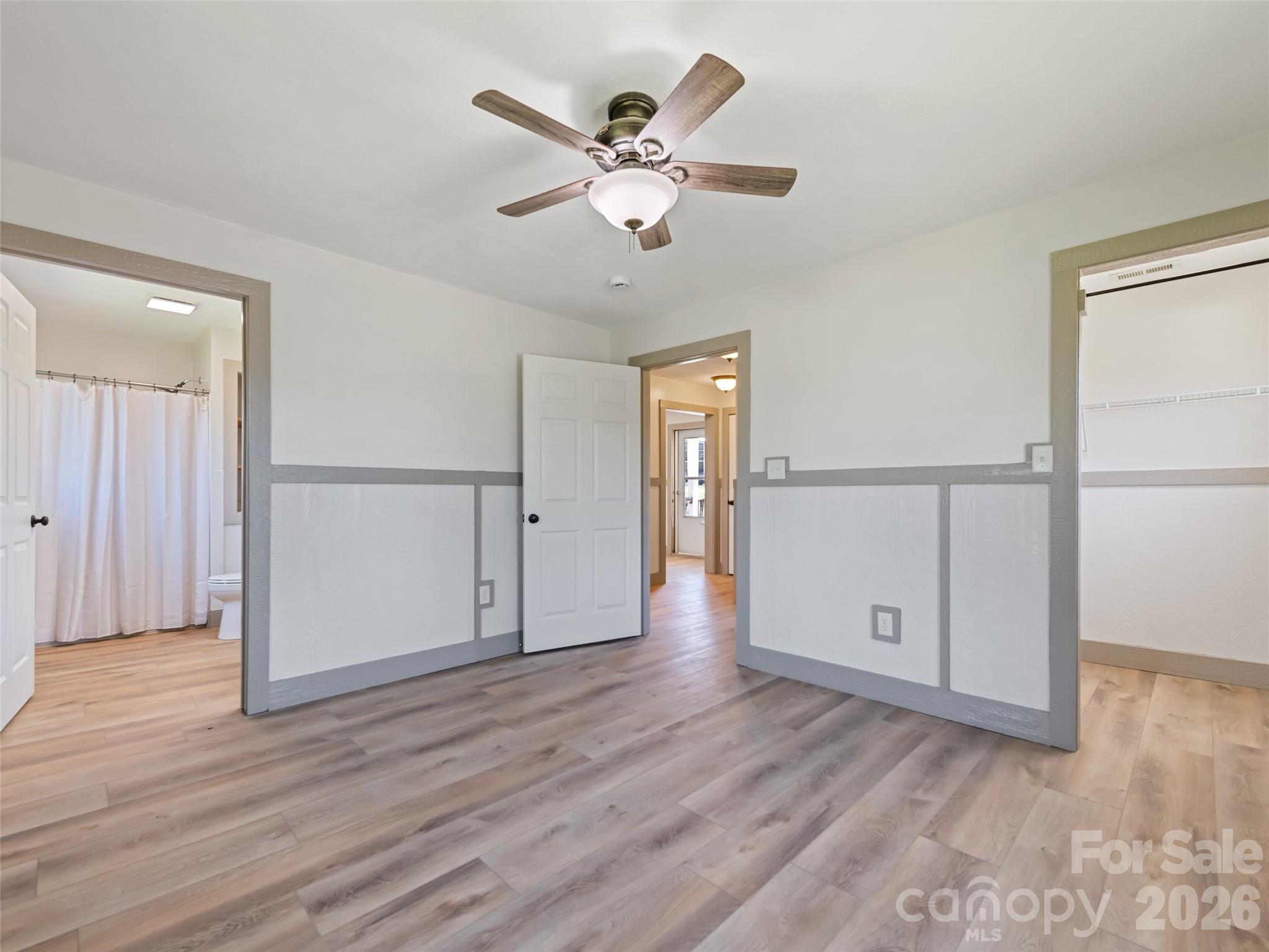 13 Depot Street Clyde, NC 28721 - Photo 20 of 21 a view of an empty room with wooden floor