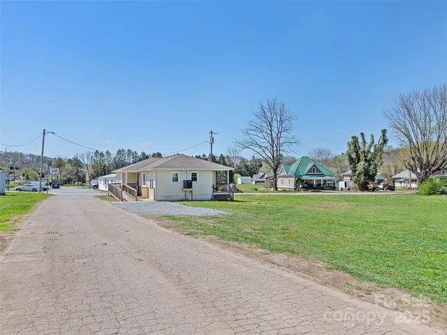 a view of a town with barn house