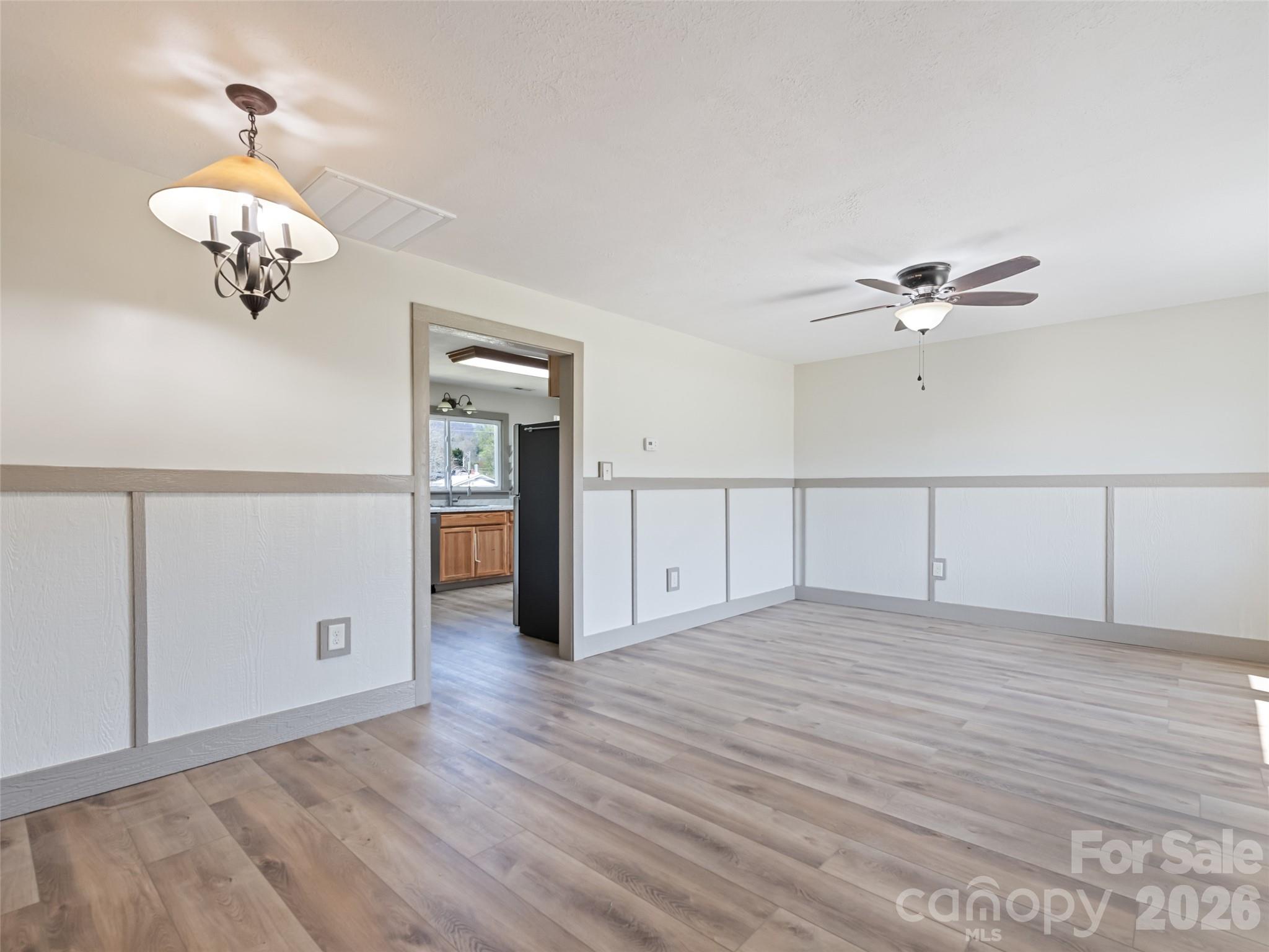 13 Depot Street Clyde, NC 28721 - Photo 7 of 21 a view of an empty room with a window