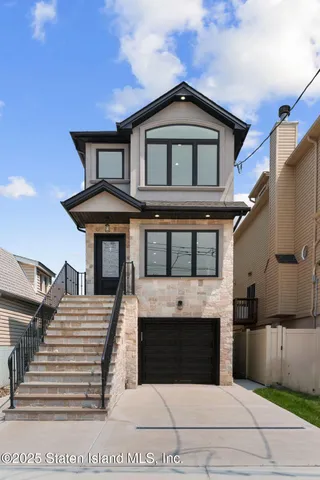 a front view of a house with a porch