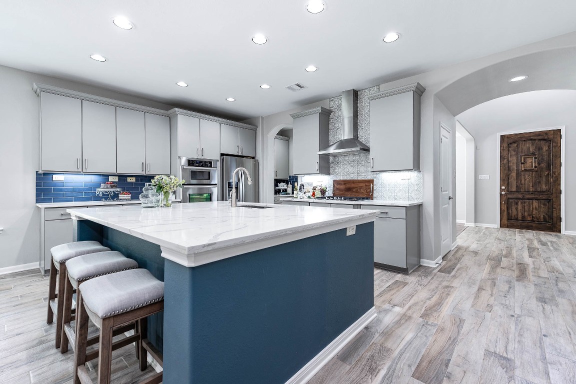 12107 Bayou Junction Road Cypress, TX 77433 - Photo 12 of 45 This kitchen is a dream to any cook in the family. Updated with tons of cabinet space, stainless appliances & space to move around.