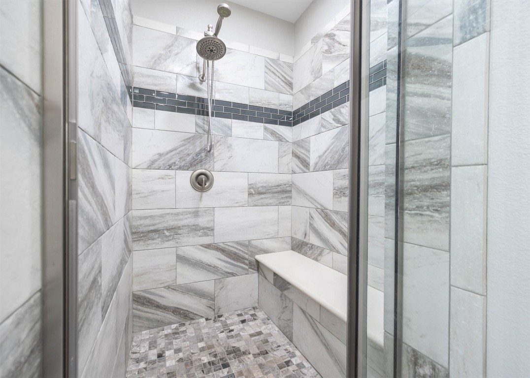 12107 Bayou Junction Road Cypress, TX 77433 - Photo 31 of 45 Oversized master shower with large seat/shelf will feel like your at a resort.