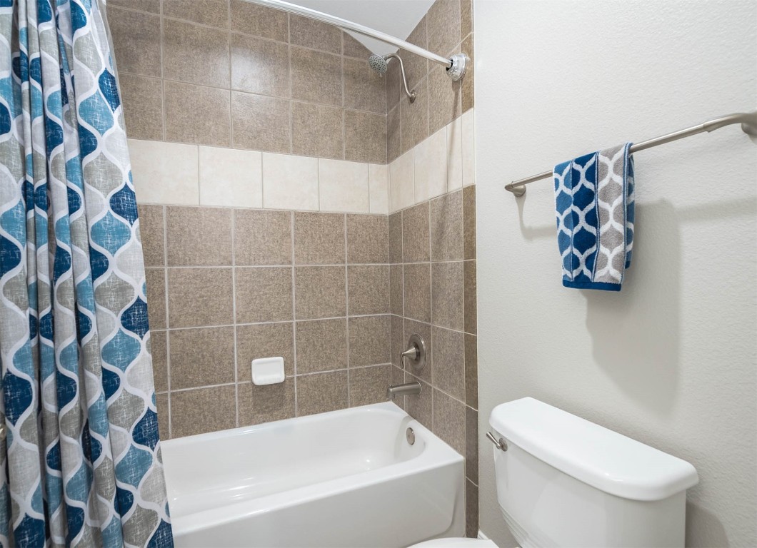 12107 Bayou Junction Road Cypress, TX 77433 - Photo 36 of 45 Jack & Jill bath opens to 2 of the secondary bedrooms and the tile has been updated since this photo.