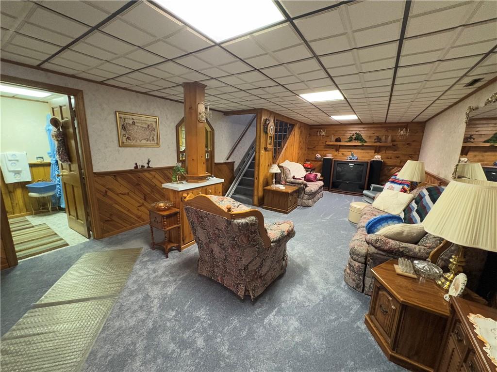 962 Reed Road Mayport, PA 16240 - Photo 18 of 22 a living room with furniture a couch and a ceiling fan