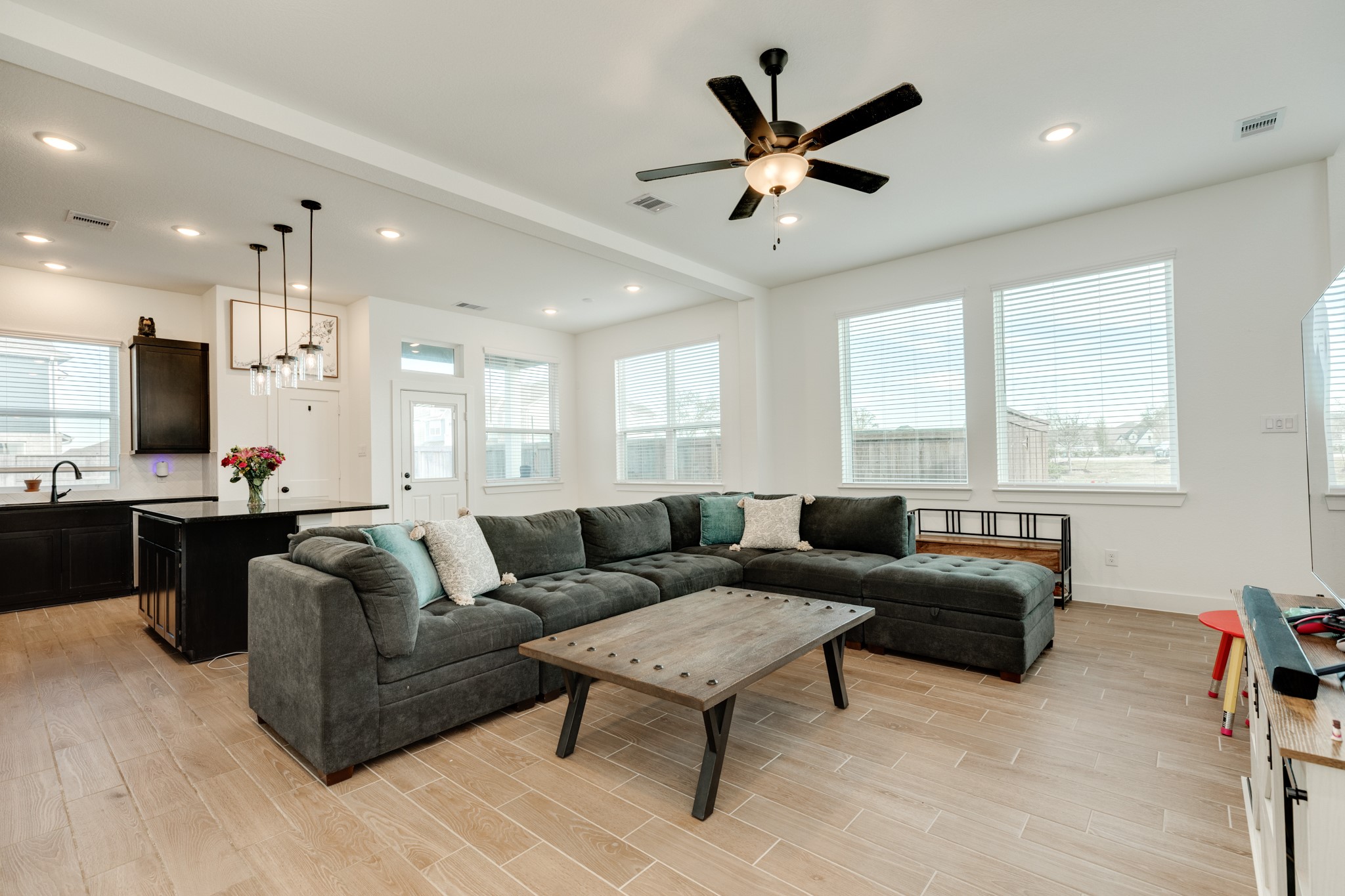 10002 Nectar Path Rosharon, TX 77583 - Photo 45 of 46 As you enter the front door, you are greeted by an open floor plan, seamlessly connecting the family room, kitchen, and dining area. The stairs are conveniently located on your left.