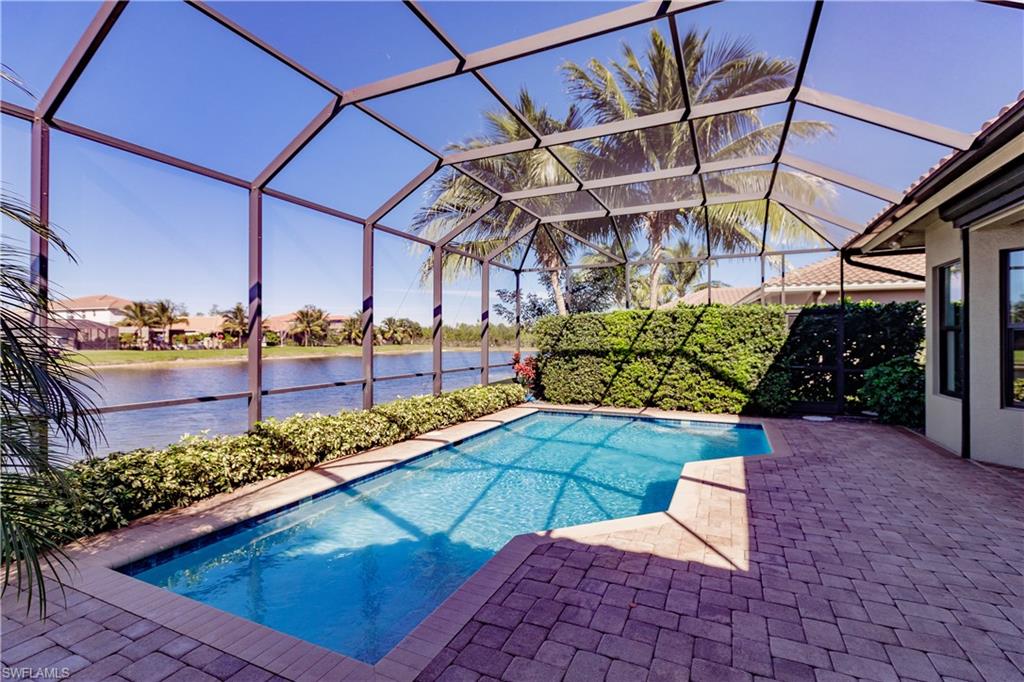 3432 Atlantic Circle Naples, FL 34119 - Photo 25 of 31 a view of a terrace with sitting area