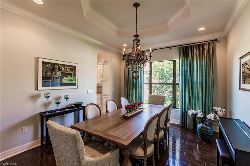 3432 Atlantic Circle Naples, FL 34119 - Photo 7 of 31 a view of a dining room with furniture window and outside view