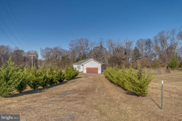 a view of a road with a yard