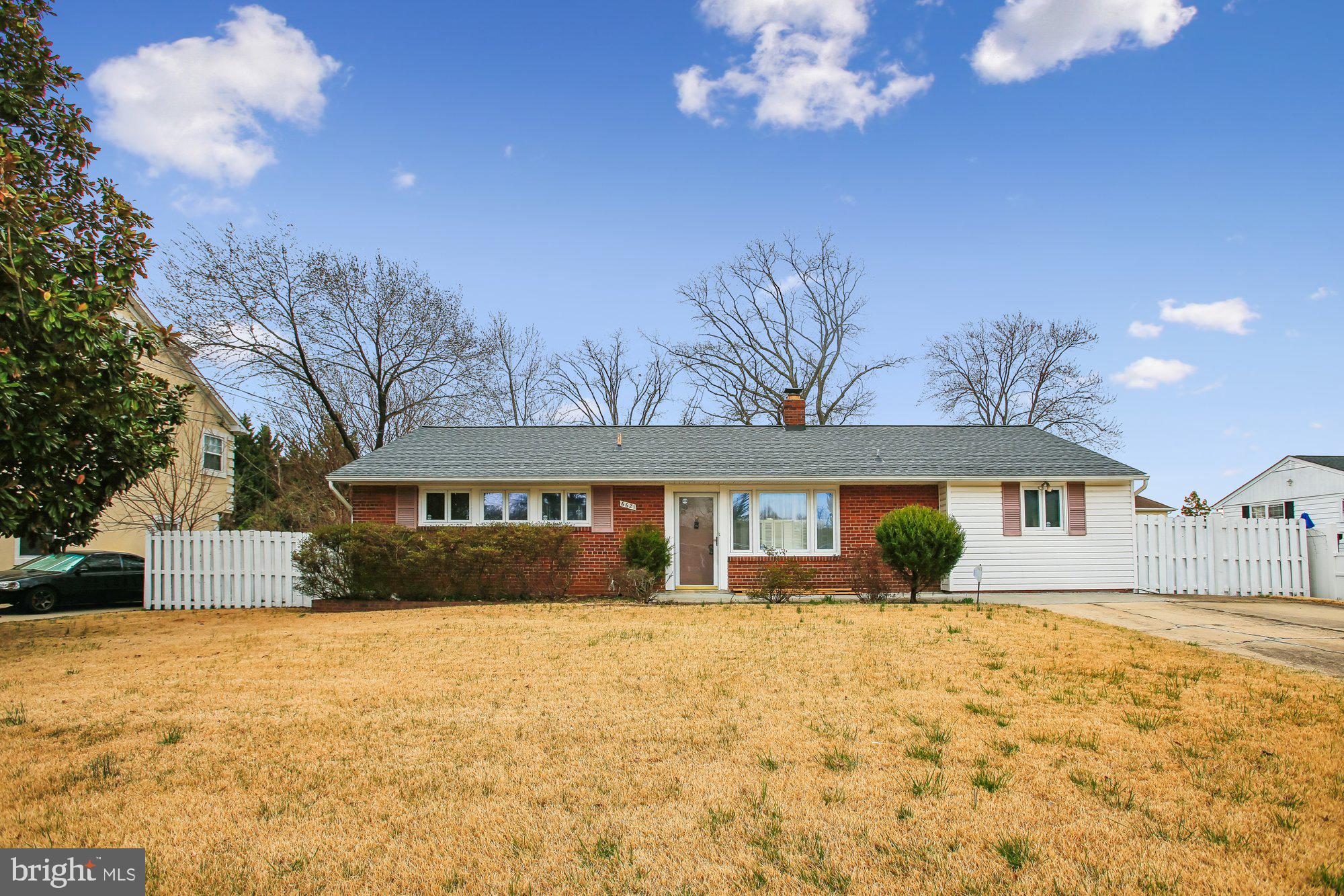 a front view of house with yard