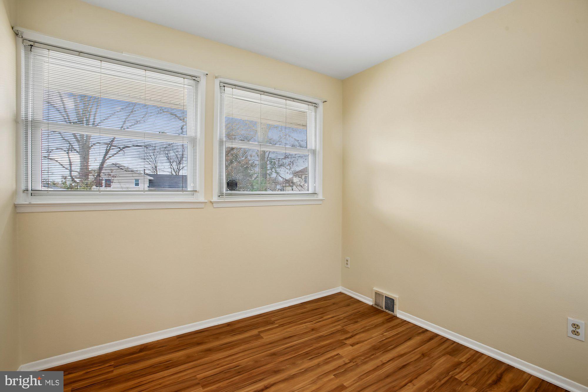 6621 Edsall Road Springfield, VA 22151 - Photo 20 of 42 a view of a small space with wooden floor and a window