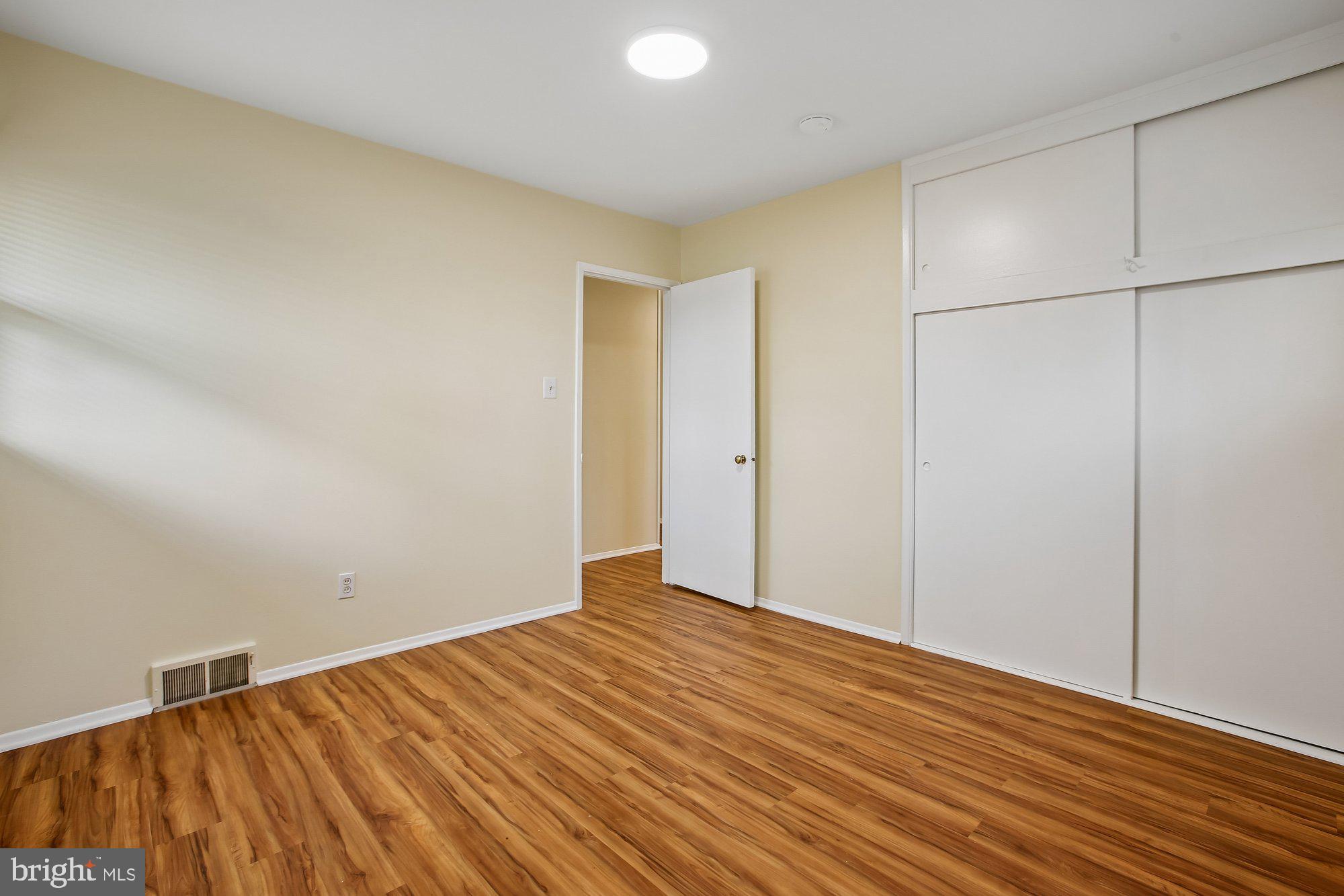 6621 Edsall Road Springfield, VA 22151 - Photo 23 of 42 a view of empty room with wooden floor